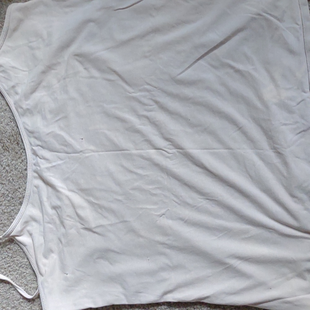 Tan undershirt.